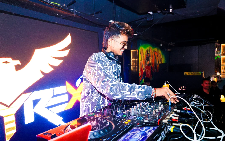 DJ Skyyrex performing at a festival booth
